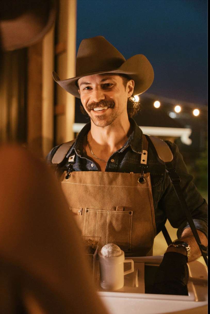 The Cowboy Cannoli serving guests at golden hour